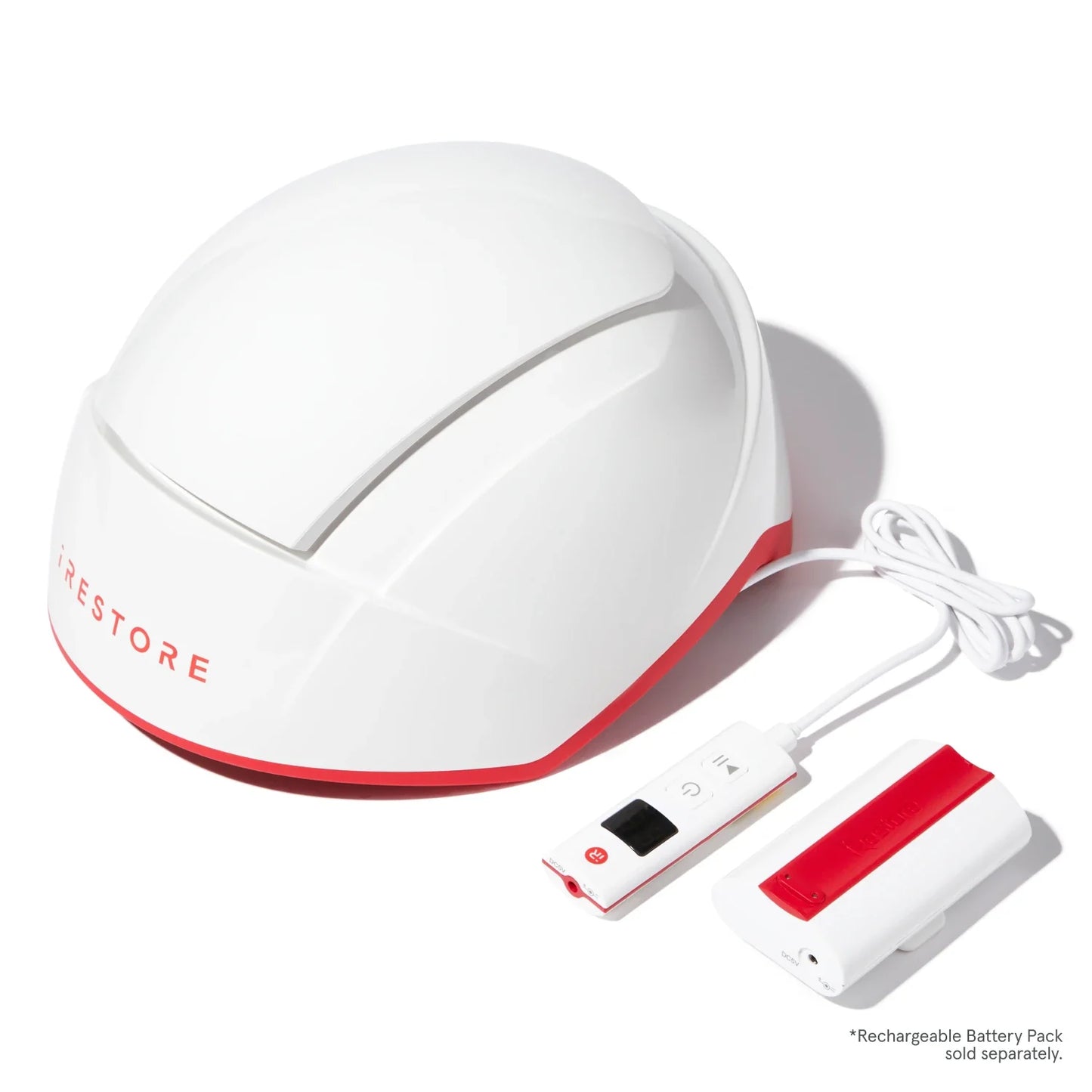 Image of the Essential helmet device beside the rechargeable battery pack.